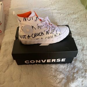 White and orange chuck Taylor’s size 5